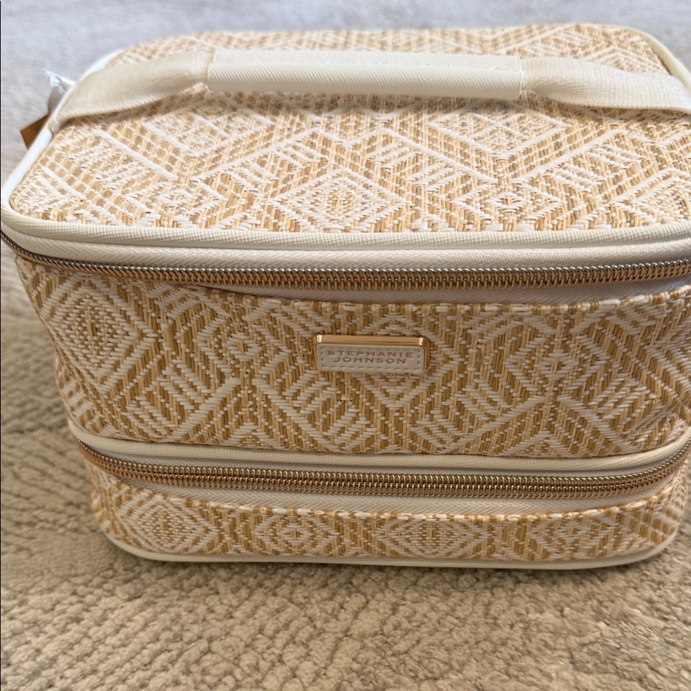 Stephanie Johnson BRAND NEW Tan and Cream Travel Case. (Original price $94)